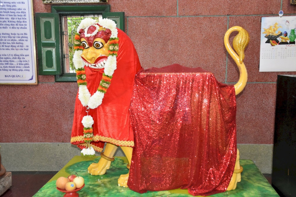 Statues placed on elevated stone pedestals, symbolizing reverence and respect for the spiritual values of the temple